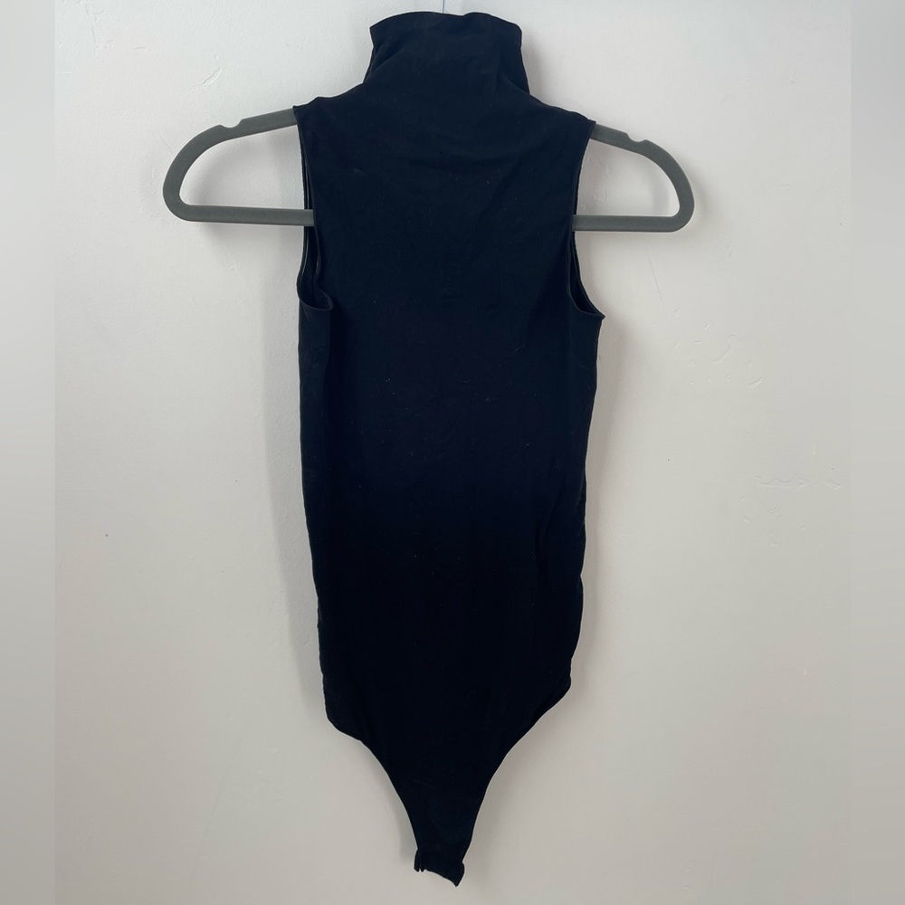 Ballet sleeveless mock neck bodysuit